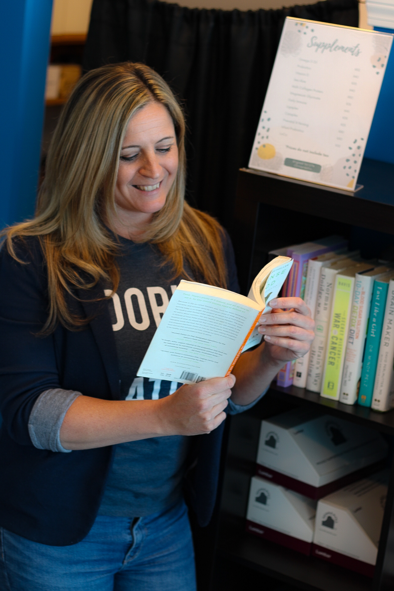 Dr. Jamie Engel reading a book Dr. Jamie Engel reading a book